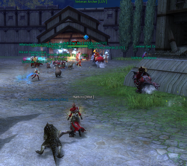 A WvW zerg taking supply from a supply depot